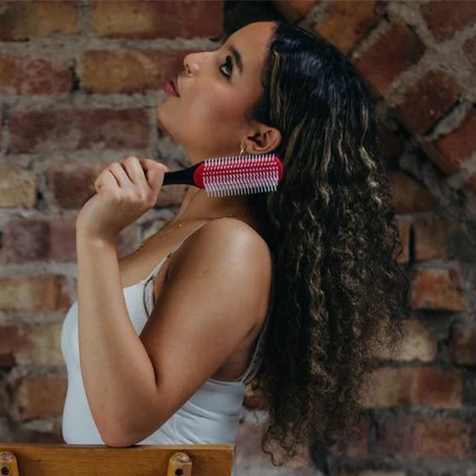 Brosse a cheveux bouclés massage et relaxation 