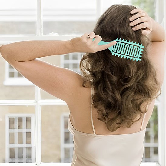 Brosse  à  cheveux   bouclés sans  endommager