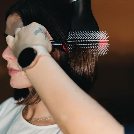 Brosse a cheveux bouclés utilisable a sec et humide 
