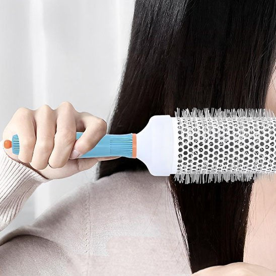 Brosse cheveux bouclés lissante 