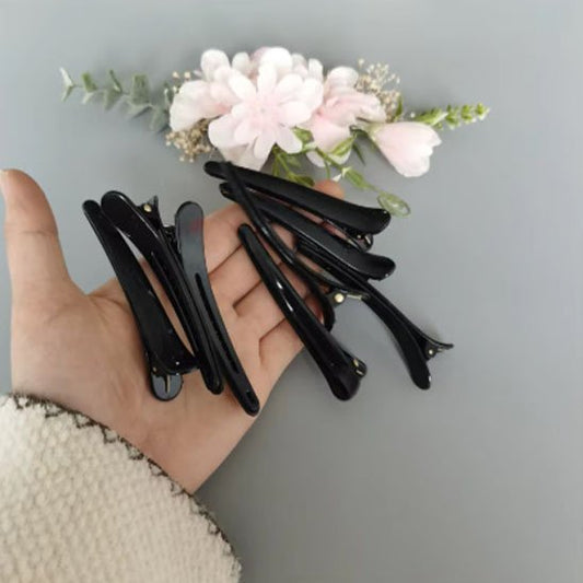 Pince à cheveux plate